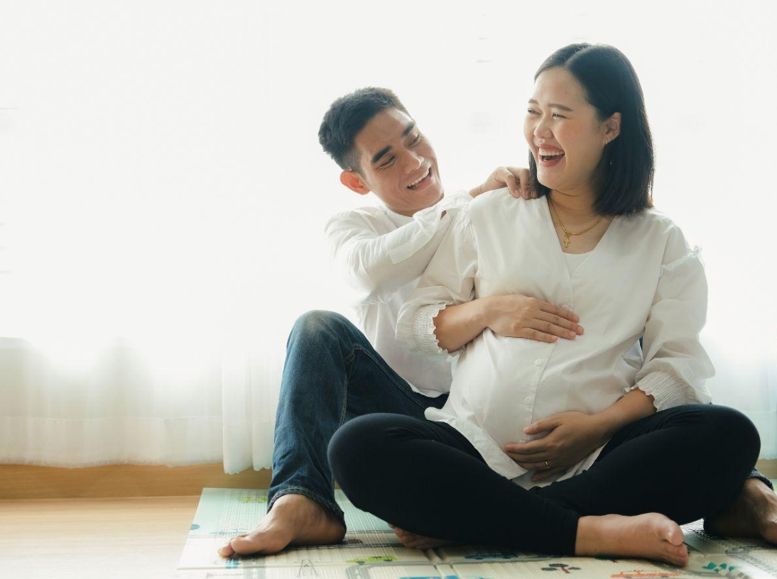 Couple enjoying pregnancy