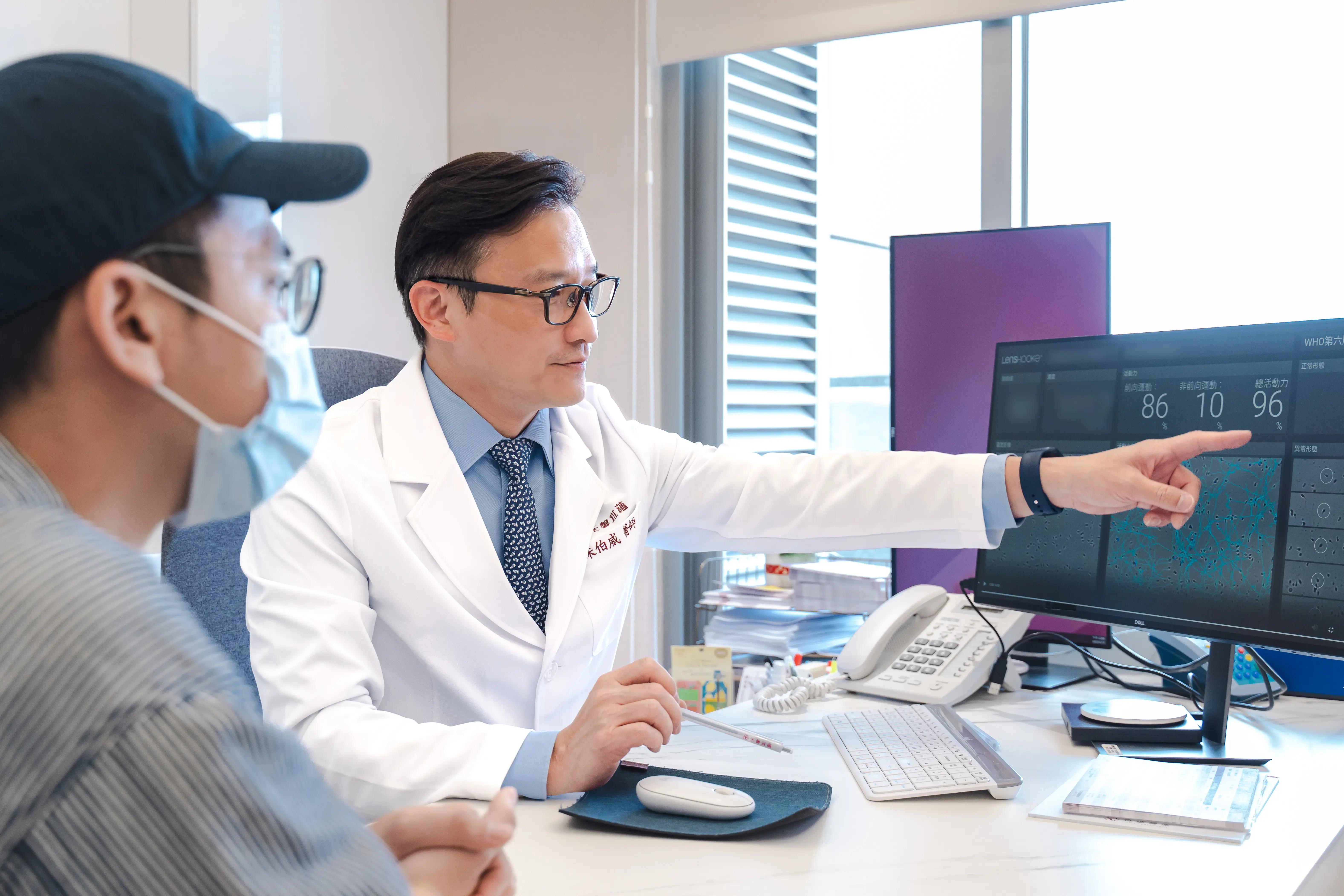 Fertility specialist explaining IVF treatment options and cost differences between US and Asia